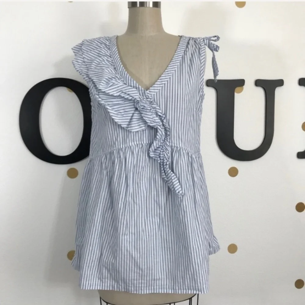 Left of Center M top size M